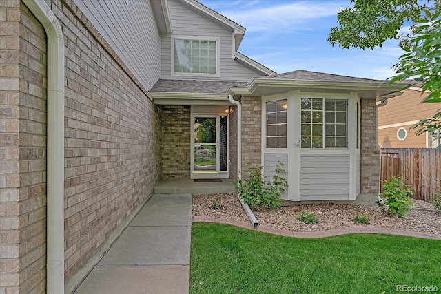 10723 W 54th Pl, Arvada, CO 80002 - entrance to property featuring brick siding and a shingled roof