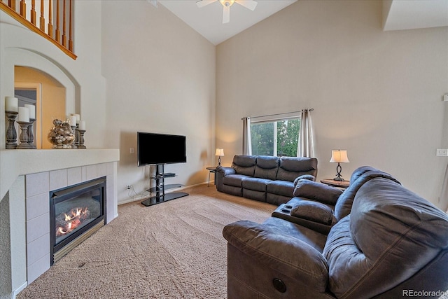 10723 W 54th Pl, Arvada, CO 80002 - living room with high vaulted ceiling, carpet floors, ceiling fan, a fireplace, and baseboards