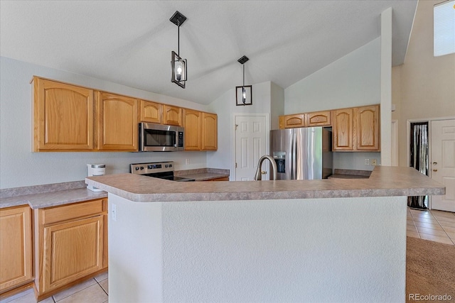 10723 W 54th Pl, Arvada, CO 80002 - kitchen featuring stainless steel appliances, light tile patterned flooring, vaulted ceiling, a center island with sink, and light countertops