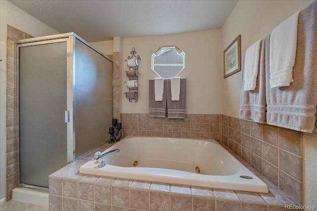 10723 W 54th Pl, Arvada, CO 80002 - bathroom with a shower stall and a tub with jets