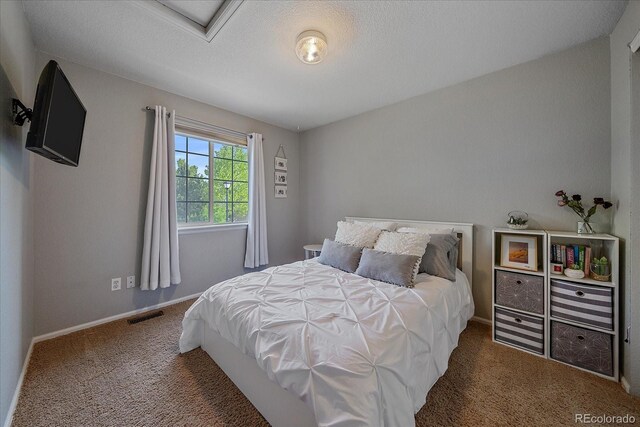 10723 W 54th Pl, Arvada, CO 80002 - bedroom with carpet floors and baseboards