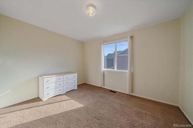 10723 W 54th Pl, Arvada, CO 80002 - spare room with light colored carpet and baseboards
