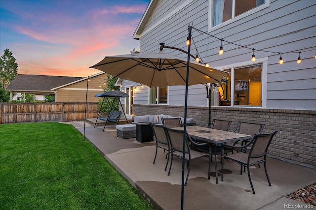 10723 W 54th Pl, Arvada, CO 80002 - patio terrace at dusk with a patio and outdoor dining area