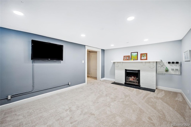 unfurnished living room featuring light colored carpet