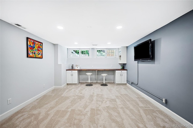 unfurnished office featuring light carpet