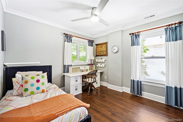 bedroom featuring dark wood-type flooring, ceiling fan, and crown molding