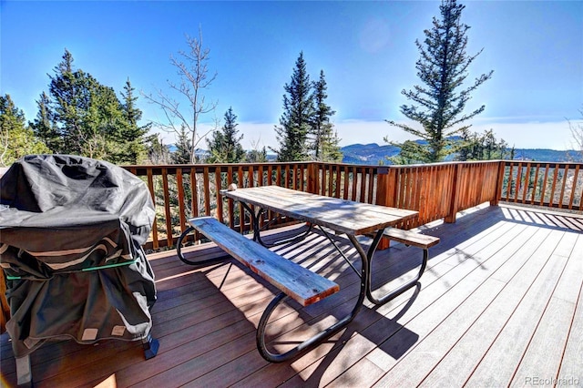 28 Concord Ct, Jefferson, CO 80456 - wooden terrace with outdoor dining area and area for grilling