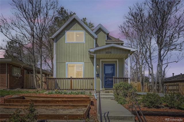 3225 Olive St, Denver, CO 80207 - view of front of property featuring covered porch