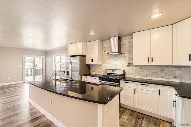 3225 Olive St, Denver, CO 80207 - kitchen with wall chimney range hood, appliances with stainless steel finishes, a sink, baseboards, and dark wood-style flooring