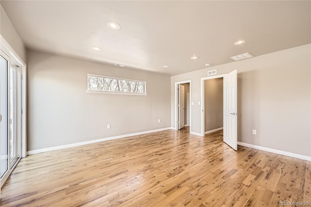 3225 Olive St, Denver, CO 80207 - spare room with light wood-type flooring, recessed lighting, and baseboards
