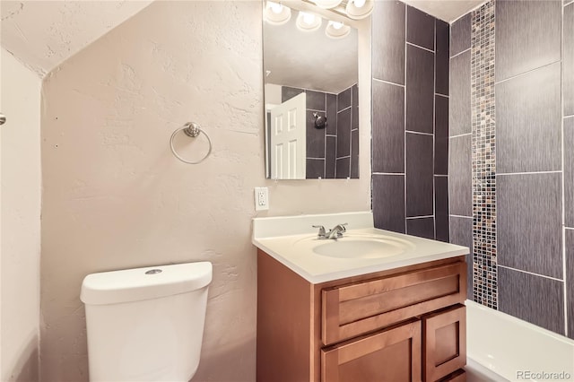 3225 Olive St, Denver, CO 80207 - bathroom featuring vanity, toilet, and  shower combination