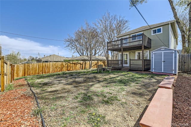 3225 Olive St, Denver, CO 80207 - back of house with a fenced backyard and a wooden deck