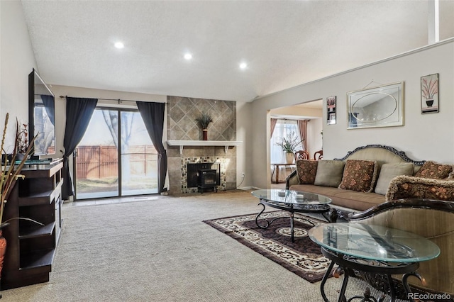 living room featuring recessed lighting, carpet flooring, and vaulted ceiling