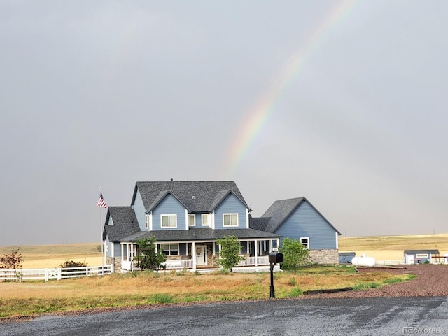 view of front of property featuring covered porch