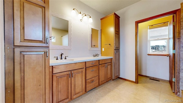 bathroom featuring vanity and tile patterned floors