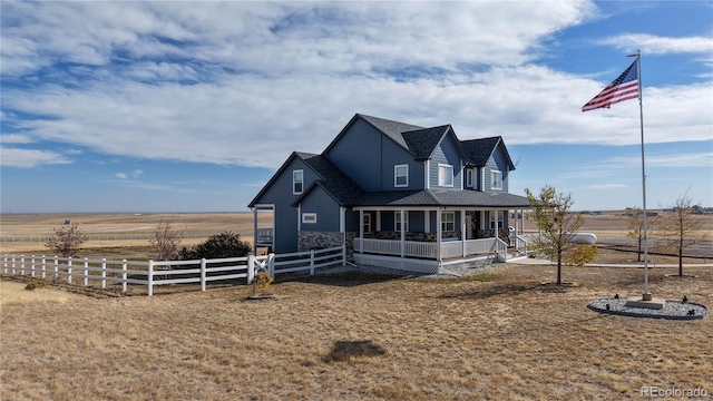 farmhouse inspired home with a rural view