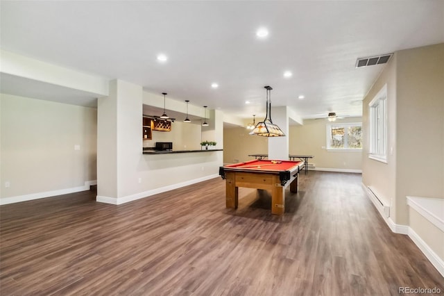 playroom with pool table, dark wood finished floors, recessed lighting, a baseboard heating unit, and baseboards