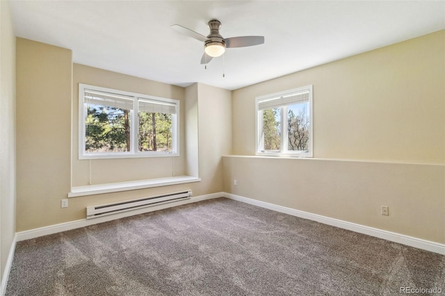 carpeted spare room featuring a baseboard radiator, ceiling fan, and baseboards