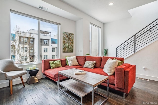 living room featuring dark hardwood / wood-style flooring