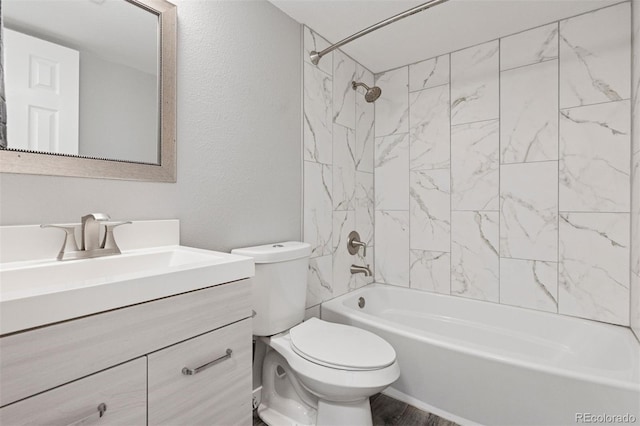 3100 S Federal Blvd Unit 331, Denver, CO 80236 - bathroom featuring vanity, toilet, shower / bath combination, wood finished floors, and a textured wall