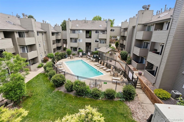 3100 S Federal Blvd Unit 331, Denver, CO 80236 - community pool featuring central AC unit, a patio, and a residential view