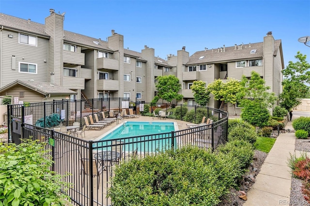 3100 S Federal Blvd Unit 331, Denver, CO 80236 - community pool with a patio