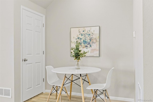 762 N Rome St, Aurora, CO 80018 - dining area featuring wood finished floors and baseboards