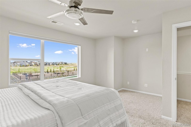762 N Rome St, Aurora, CO 80018 - bedroom featuring light carpet, baseboards, a ceiling fan, and recessed lighting