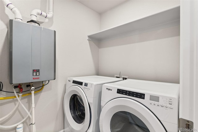 762 N Rome St, Aurora, CO 80018 - washroom featuring separate washer and dryer and tankless water heater