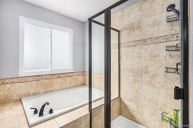 bathroom with shower with separate bathtub