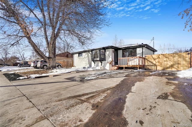 view of front of home with a deck