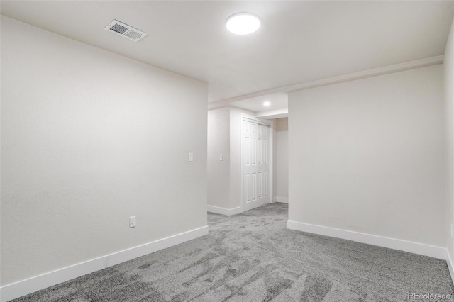 unfurnished room featuring carpet floors