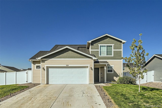 529 Beckwourth, Fort Lupton, CO 80621 - view of front of home featuring driveway and an attached garage