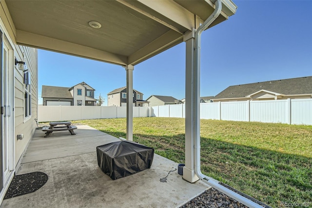529 Beckwourth, Fort Lupton, CO 80621 - fenced backyard with a patio area and a grill