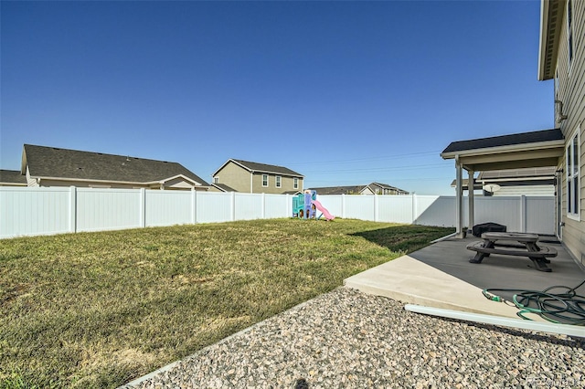 529 Beckwourth, Fort Lupton, CO 80621 - fenced backyard with a playground and a patio area