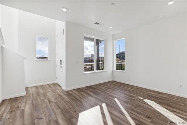 interior space with hardwood / wood-style flooring