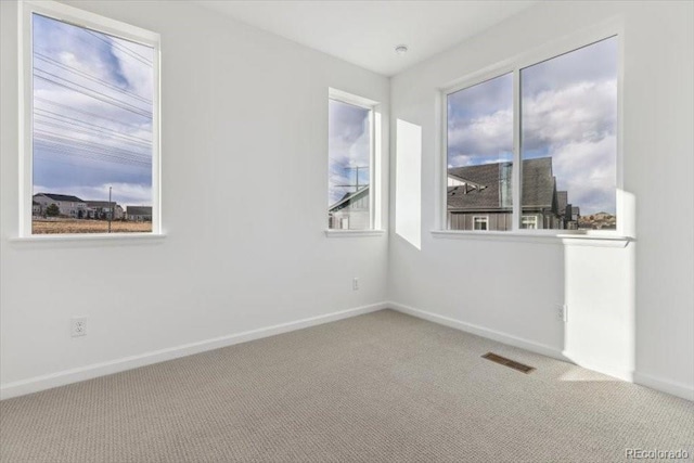 empty room with light carpet