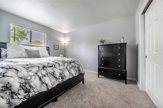 4571 S Memphis St, Aurora, CO 80015 - carpeted bedroom with a textured ceiling and baseboards