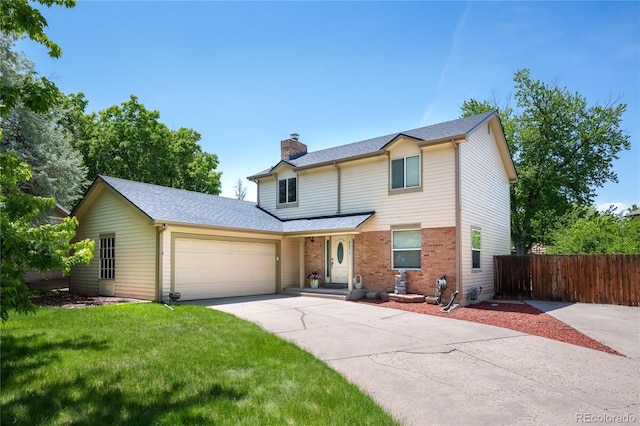 4571 S Memphis St, Aurora, CO 80015 - traditional-style home featuring a chimney, an attached garage, driveway, brick siding, and a shingled roof