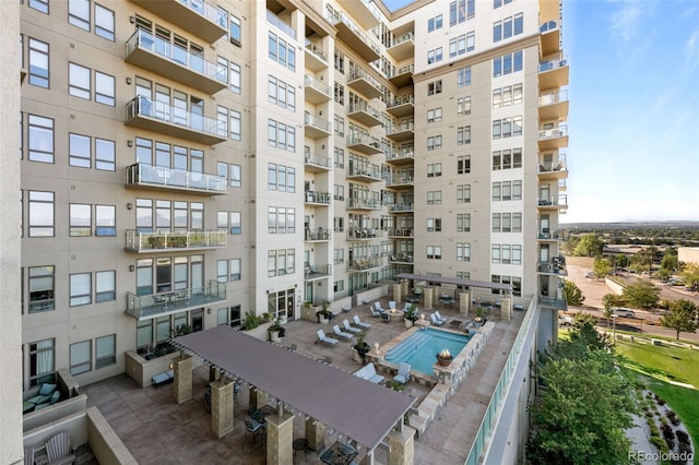 view of property featuring a community pool