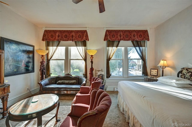 bedroom featuring ceiling fan and carpet floors