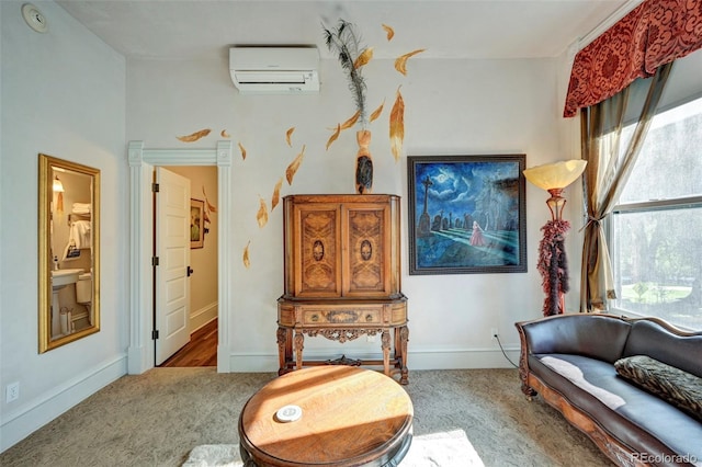 sitting room with a healthy amount of sunlight and a wall mounted air conditioner