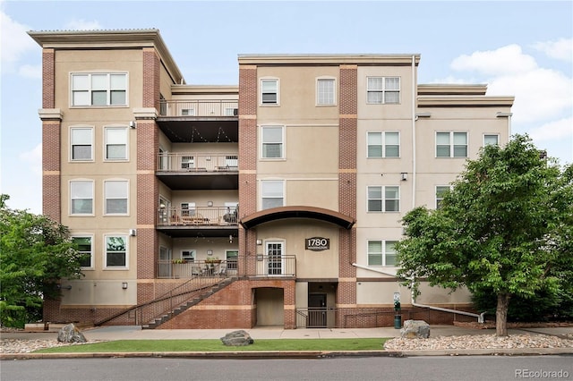 1780 N Washington St Unit 305, Denver, CO 80203 - view of apartment building / complex with stairway