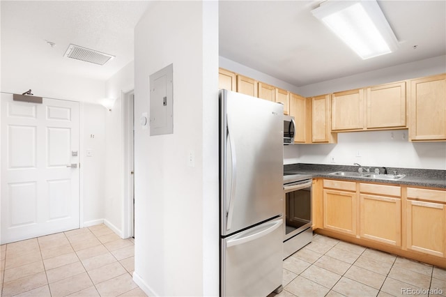 1780 N Washington St Unit 305, Denver, CO 80203 - kitchen with appliances with stainless steel finishes, light brown cabinets, electric panel, and light tile patterned flooring