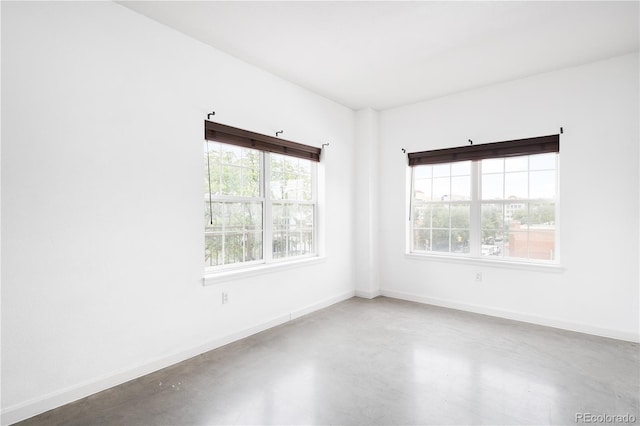 1780 N Washington St Unit 305, Denver, CO 80203 - unfurnished room with concrete flooring and baseboards