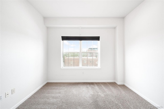 1780 N Washington St Unit 305, Denver, CO 80203 - carpeted empty room with baseboards