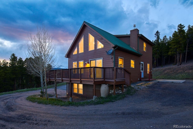 view of front of property featuring a wooden deck