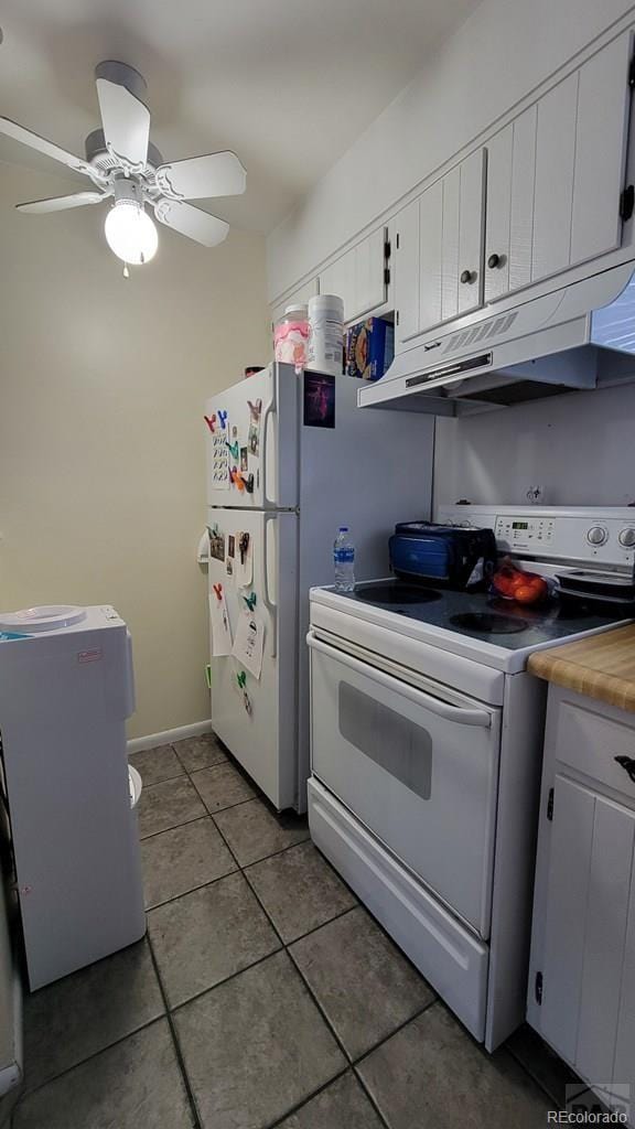 kitchen featuring white cabinetry, a ceiling fan, under cabinet range hood, light tile patterned flooring, and white electric stove