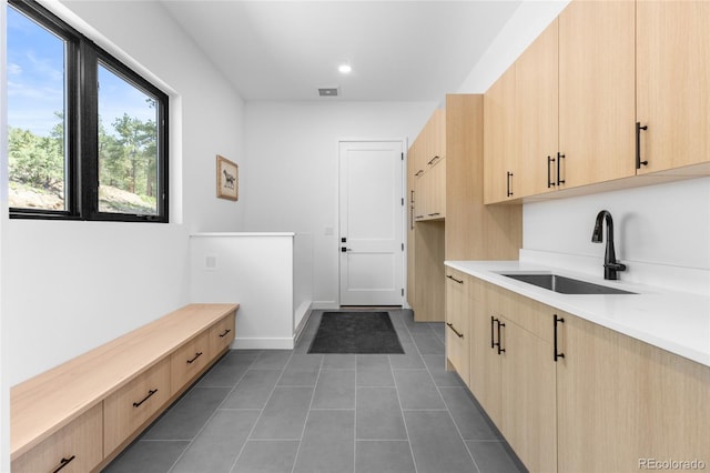 13415 S Resort Dr, Conifer, CO 80433 - mudroom with dark tile patterned floors and recessed lighting