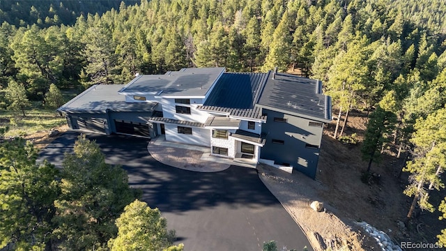 13415 S Resort Dr, Conifer, CO 80433 - view from above of property featuring a heavily wooded area